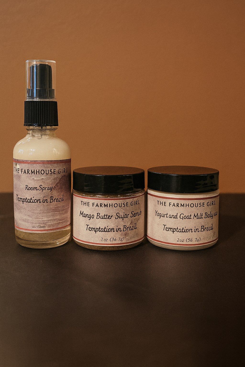 Three products from 'The Farmhouse Girl' on a brown background